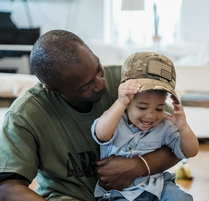 A veteran with his child